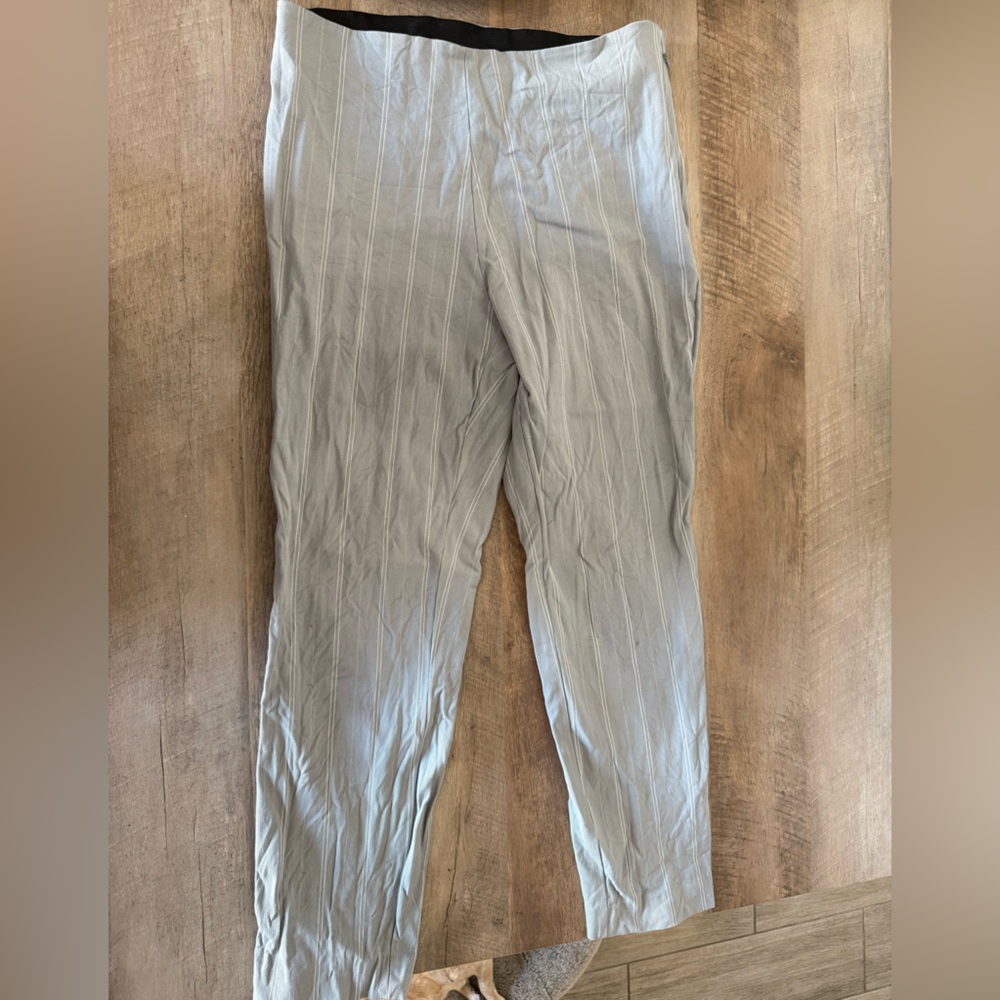 Light blue and white striped trousers